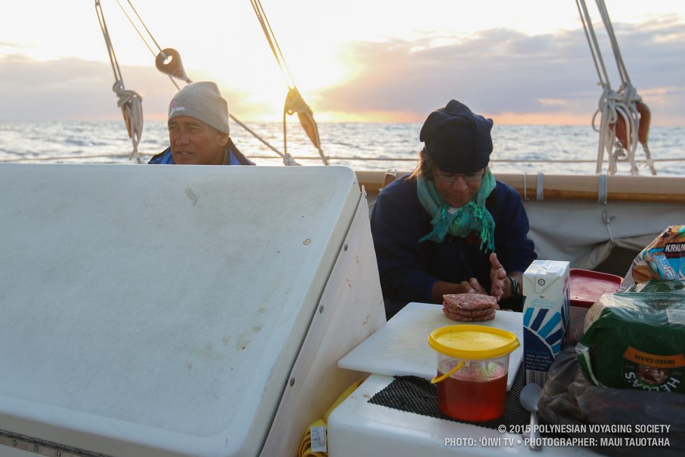 Captain Bruce and First Mate Hauʻoli making breakfast.