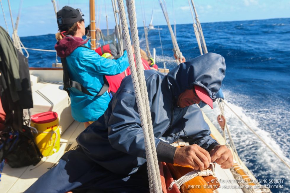 Duane taking off sail ties to change out the sail.