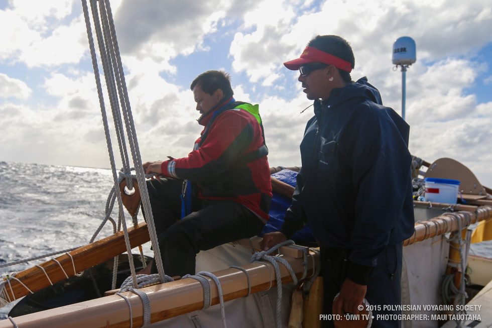 Matahi and Duane getting ready to pull tight on a back stay.