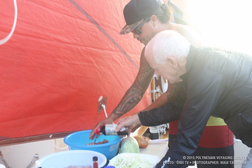 Irish adding some shoyu to the poke.