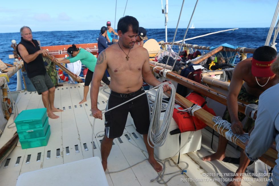Matahi coiling line while changing out the sails.