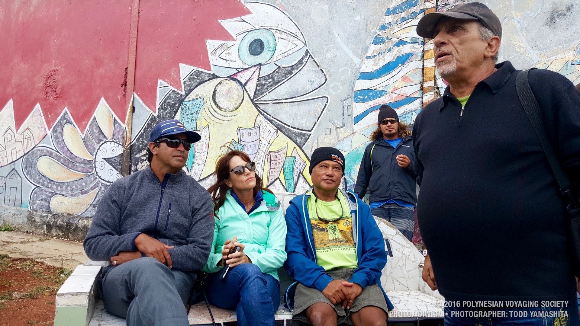 Kawika, Shawn, Kalepa and Puaita listen in as Rodriguez Sanchez shares stories about the art center.