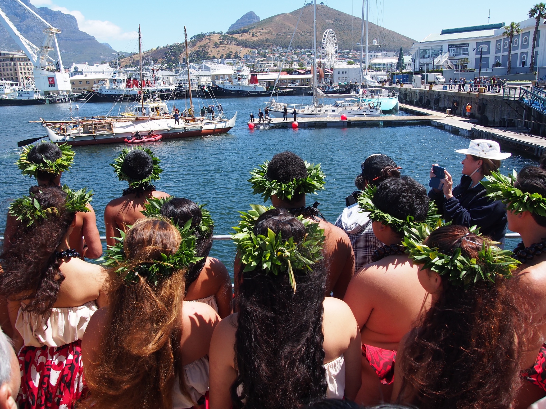 Ke Kā Makali'i and land crew oli as Hōkūle'a officially arrives in Cape Town at the Ceremony of Friendship on November 14, 2015.