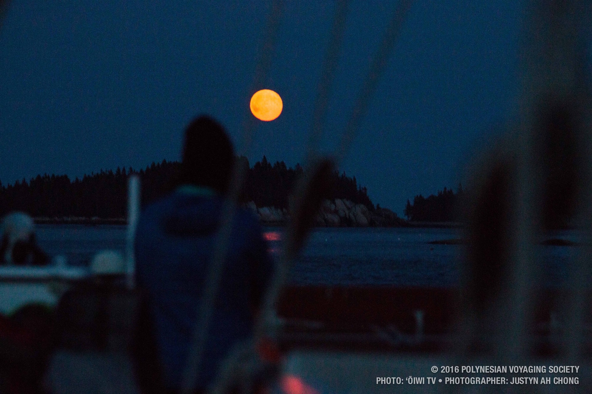 A blood red moonrise from the deck of the canoe.