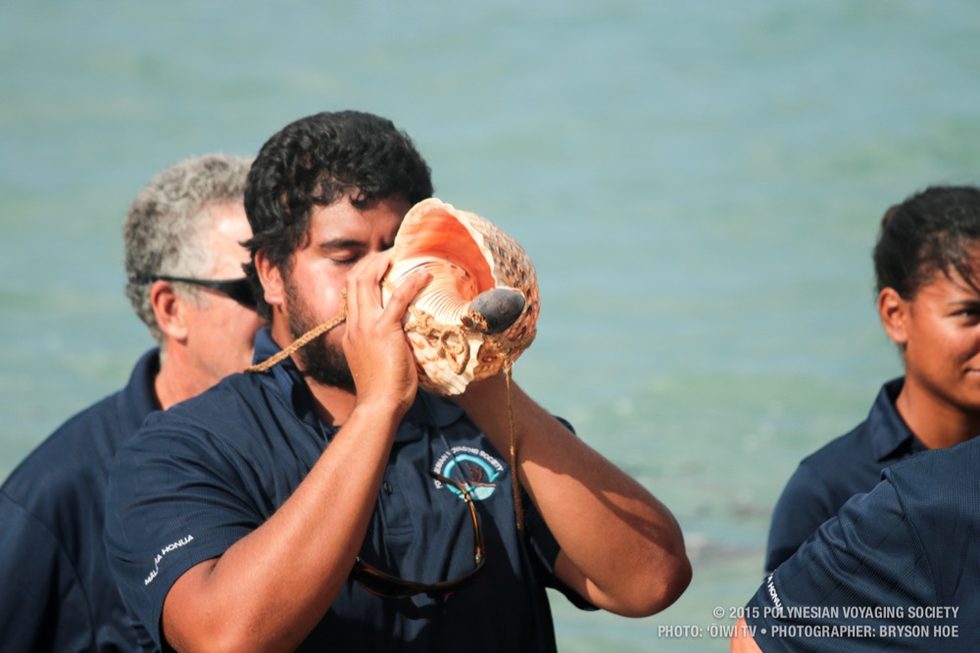 Nakua blowing the pū