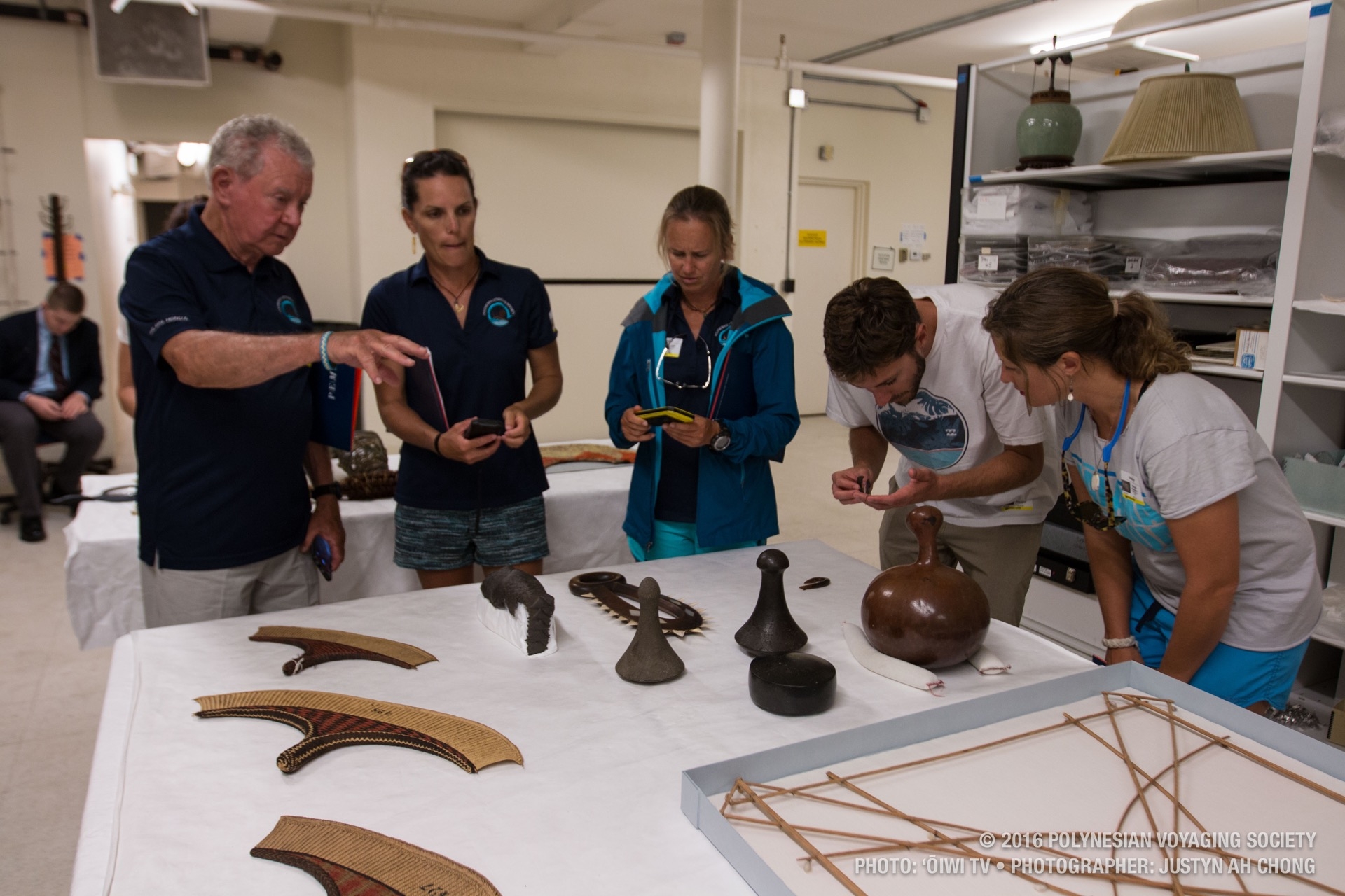 The crew takes a look at different Hawaiian artificats in the Peabody Essex collection.