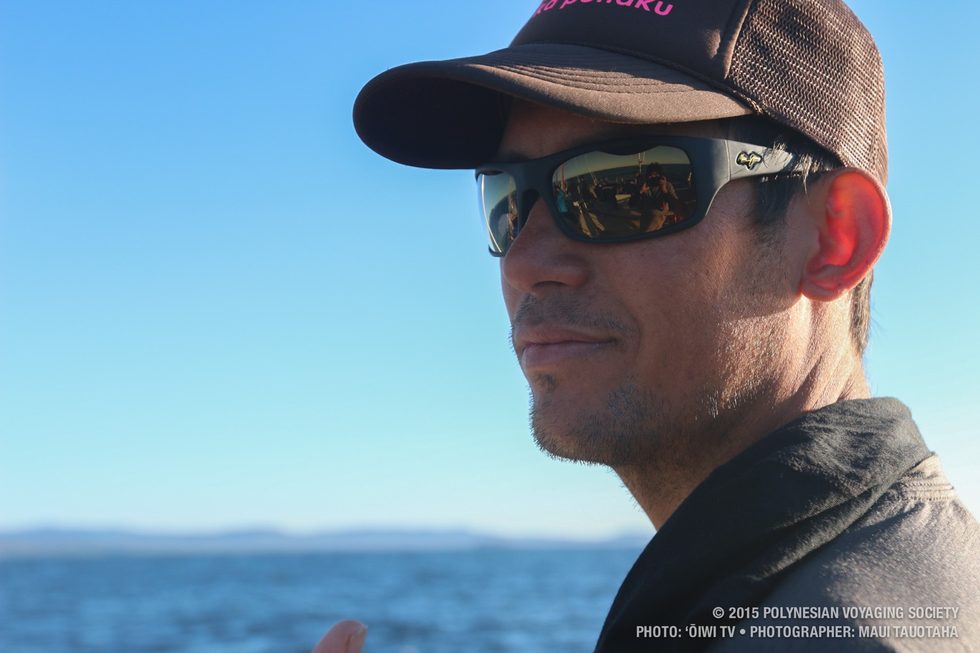 Navigator Kaleo Wong taking in sight of land.