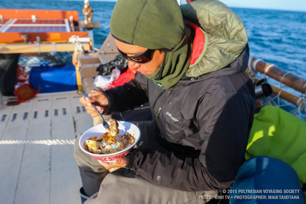 Kaleo staying warm while eating his loco moco breakfast.